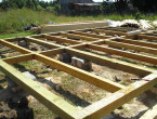 Начало строительства дома из бруса 6×5 на основе опорно-столбчатого фундамента.